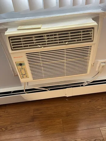 a bathroom with a shower and a toilet