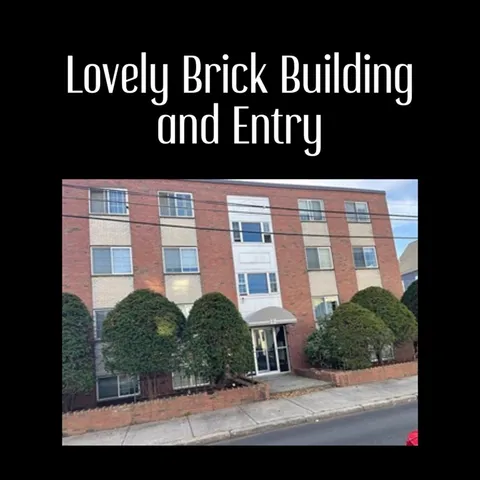 a view of a house with backyard and deck