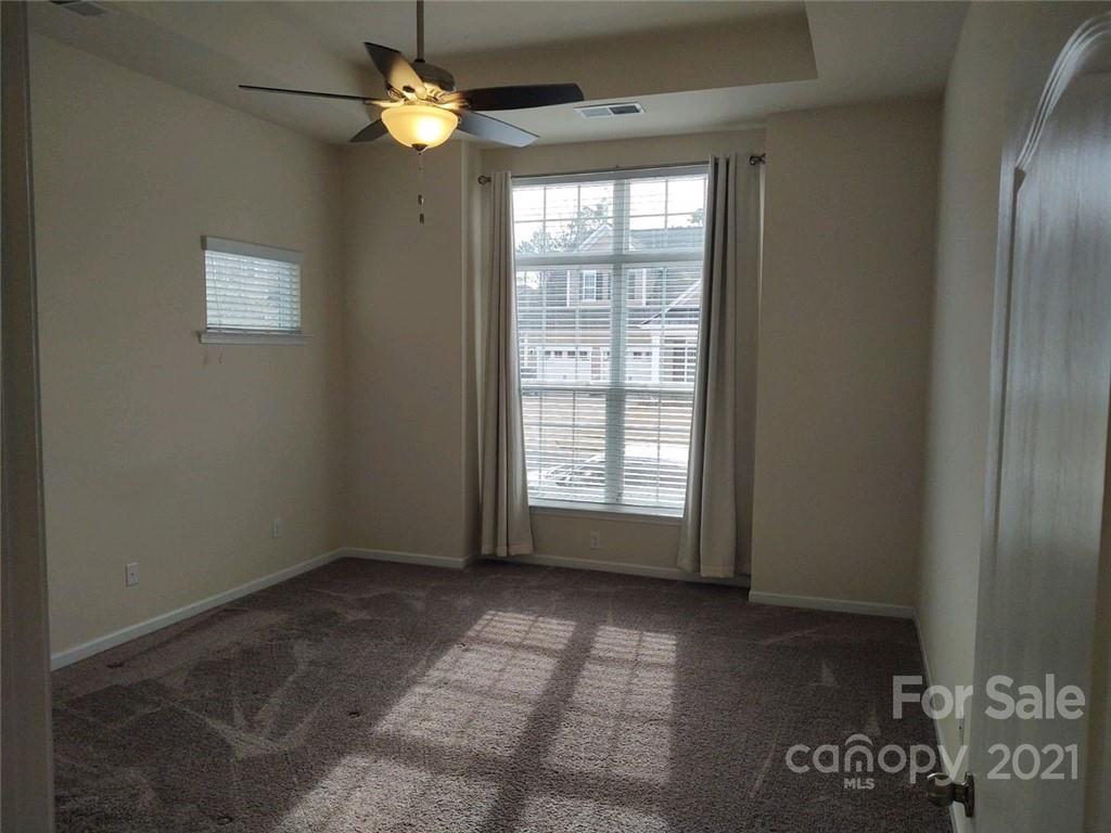 5077 Waterloo Drive Tega Cay, SC 29708 - Photo 5 of 15 a view of an empty room with a window