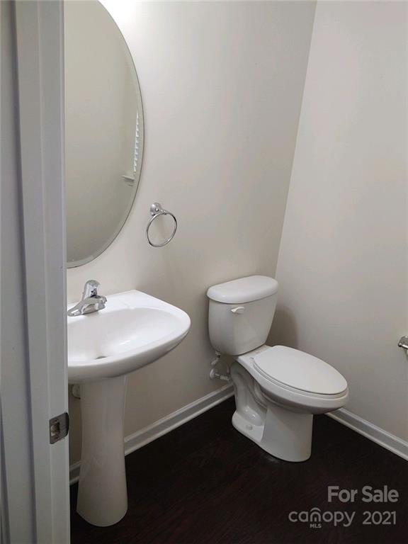 5077 Waterloo Drive Tega Cay, SC 29708 - Photo 6 of 15 a bathroom with a sink toilet and a mirror