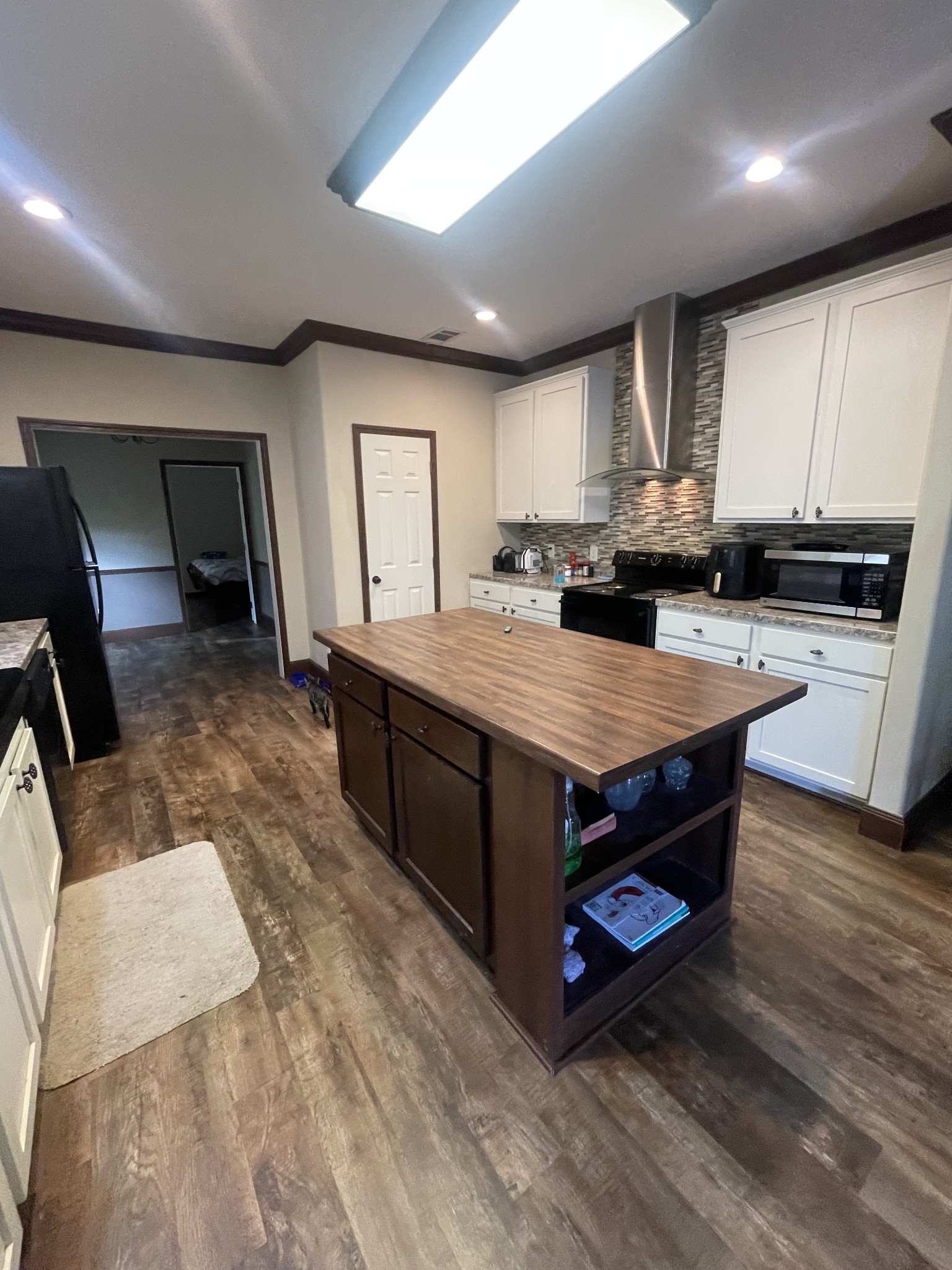 48 Jenkins Village Road Red Boiling Springs, TN 37150 - Photo 5 of 10 a kitchen with sink stove and cabinets