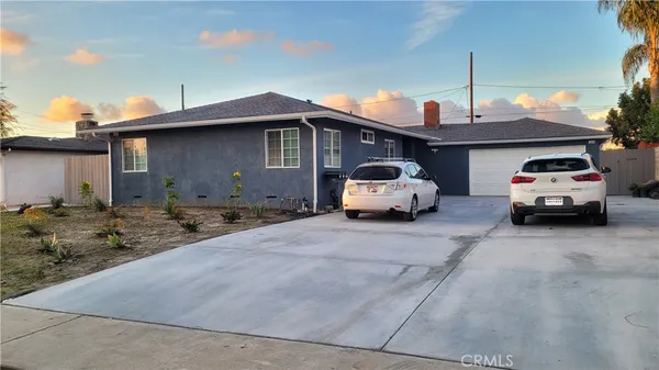 a car parked in front of a house
