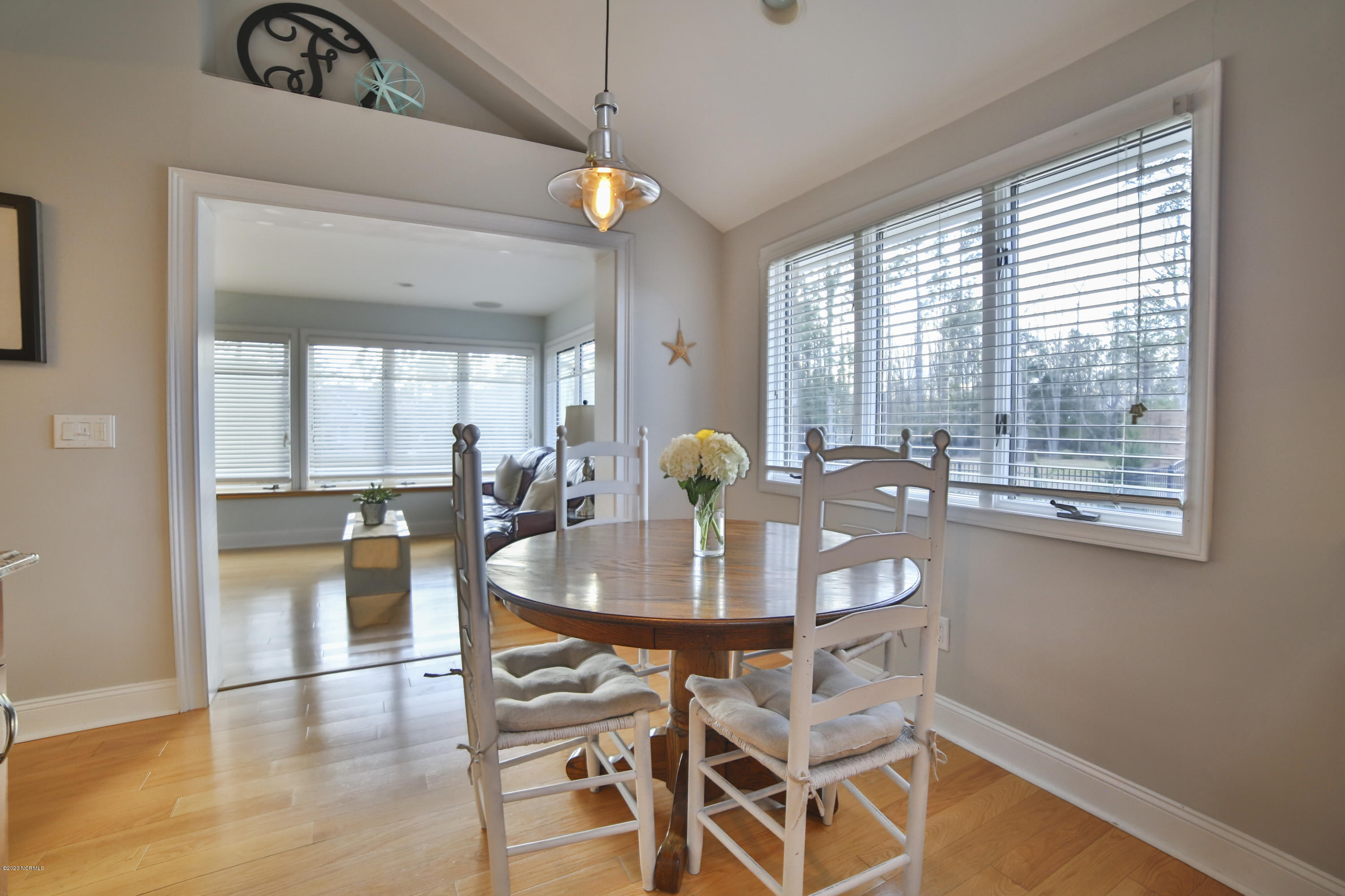 205 Olde Point Loop Hampstead, NC 28443 - Photo 17 of 63 Breakfast area is open to sunroom room/family room