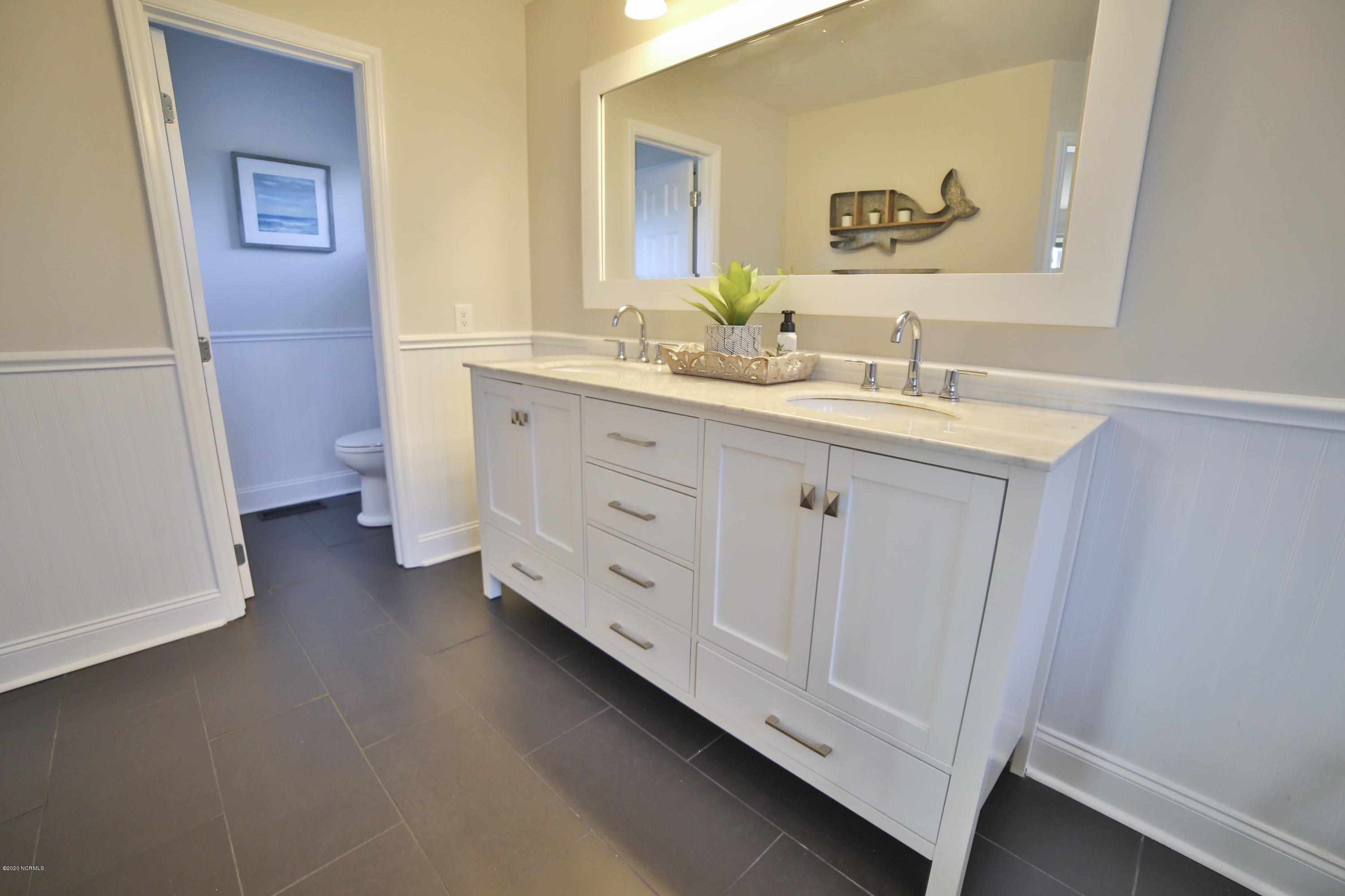 205 Olde Point Loop Hampstead, NC 28443 - Photo 26 of 63 Love the beadboard wainscotting