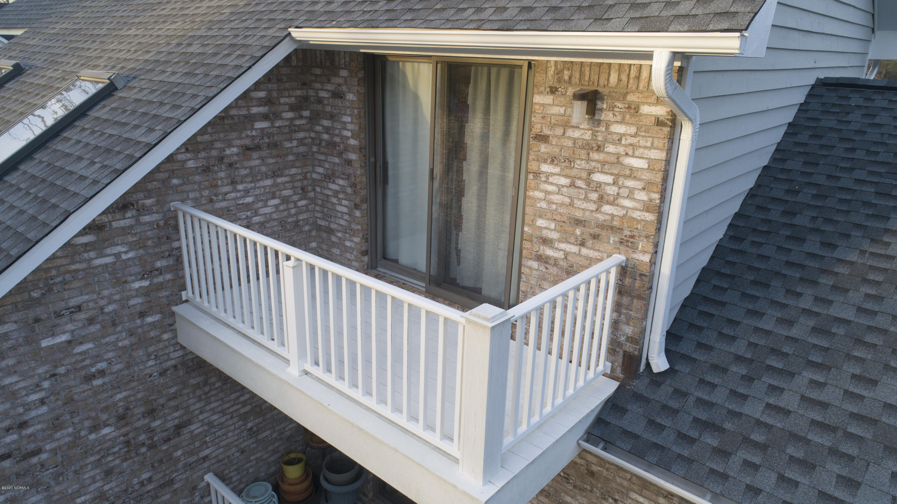 205 Olde Point Loop Hampstead, NC 28443 - Photo 41 of 63 Balcony off guest room