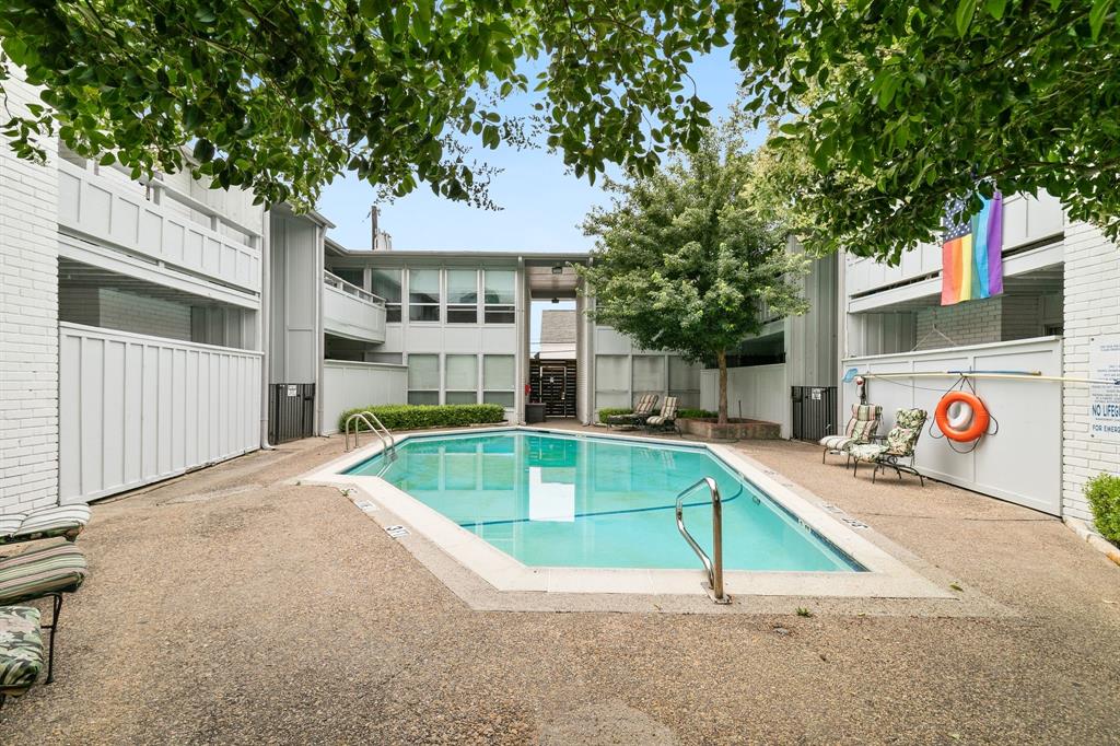 4347 Dickason Avenue, Unit 111 Dallas, TX 75219 - Photo 29 of 37 a house view with a backyard space