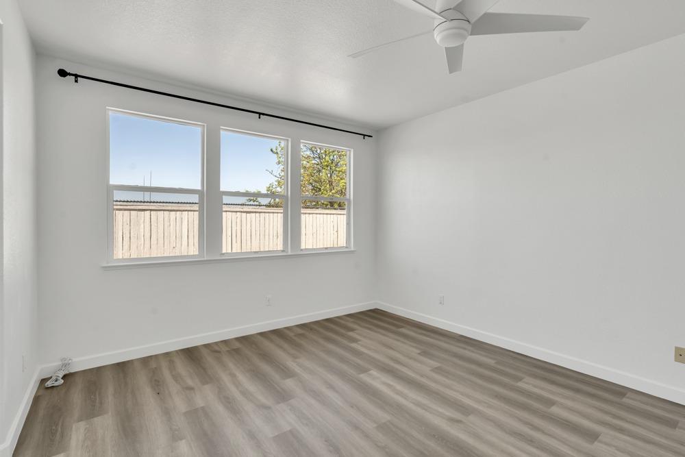 6217 Jefjen Way Elk Grove, CA 95757 - Photo 17 of 41 an empty room with a window