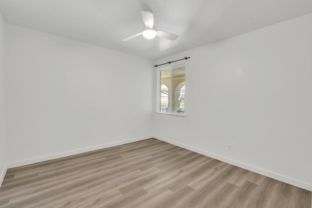 6217 Jefjen Way Elk Grove, CA 95757 - Photo 23 of 41 wooden floor in an empty room