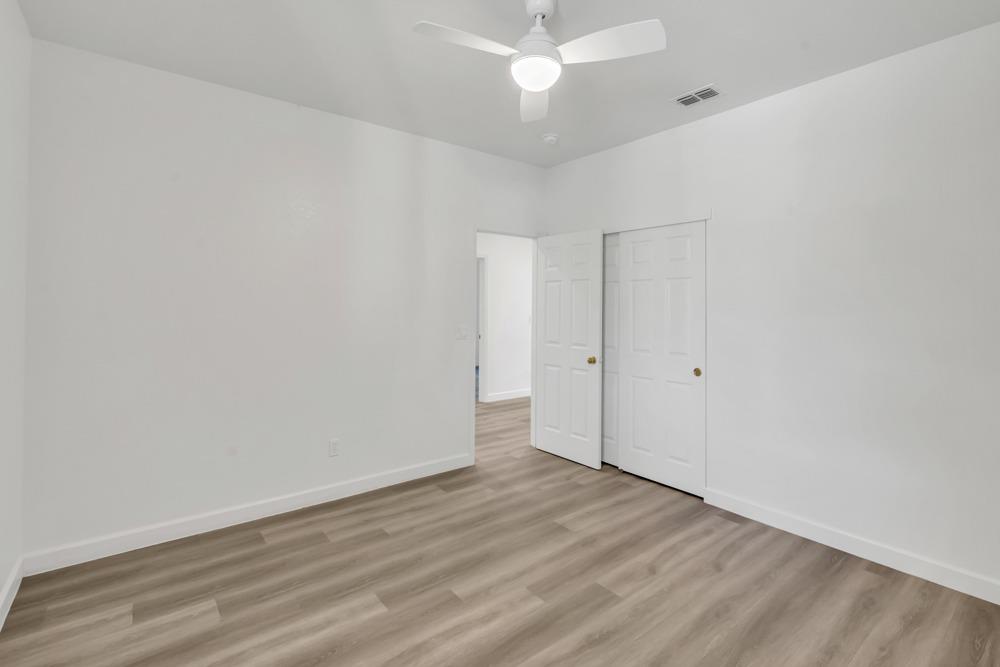 6217 Jefjen Way Elk Grove, CA 95757 - Photo 24 of 41 wooden floor in an empty room