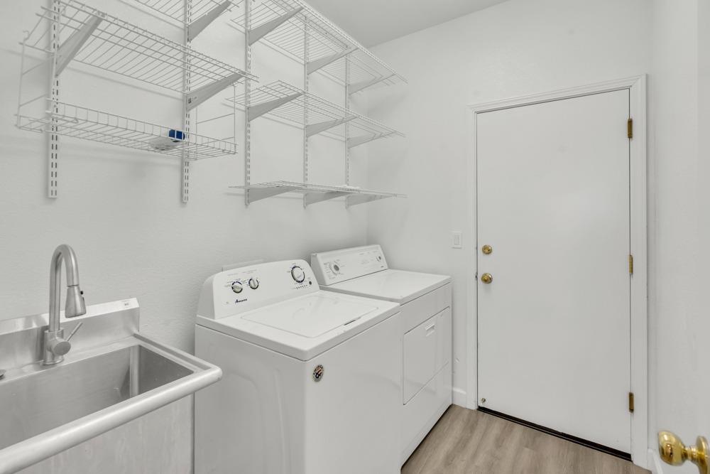 6217 Jefjen Way Elk Grove, CA 95757 - Photo 32 of 41 a utility room with dryer and washer