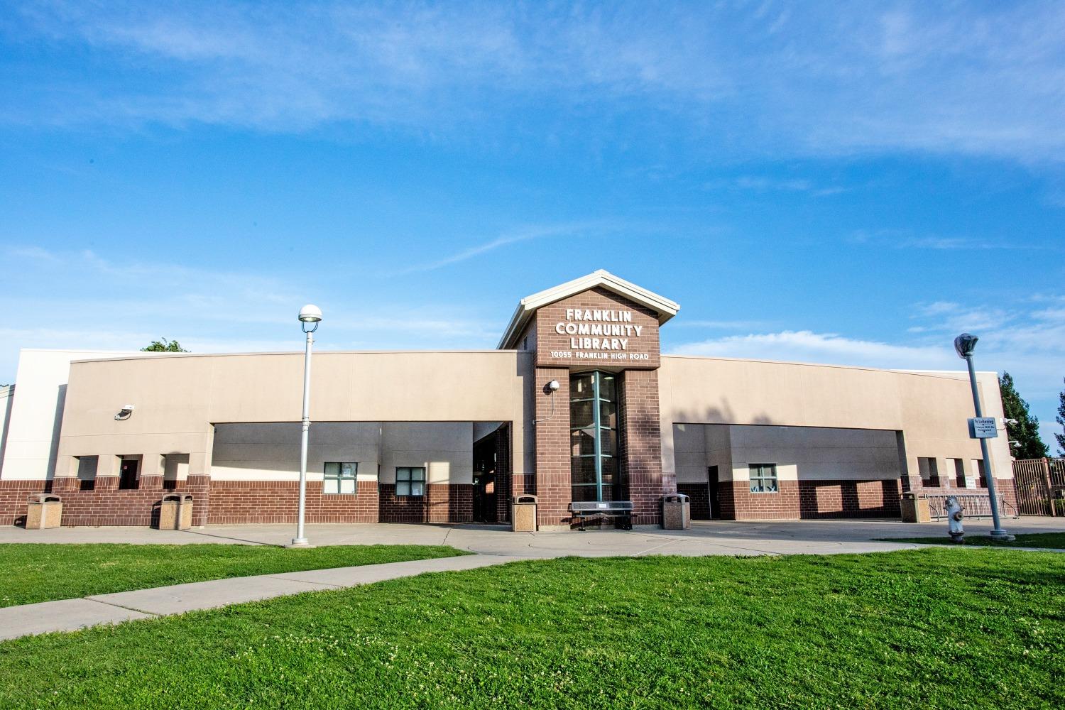 6217 Jefjen Way Elk Grove, CA 95757 - Photo 40 of 41 a view of a big house with a big yard and large trees