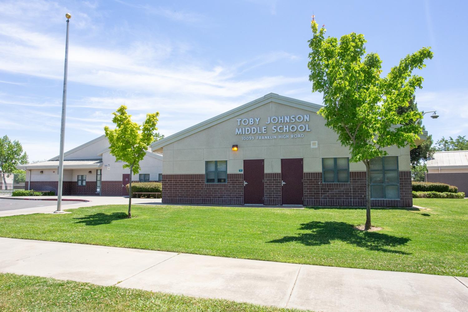 6217 Jefjen Way Elk Grove, CA 95757 - Photo 41 of 41 a view of a house with a yard and a garden