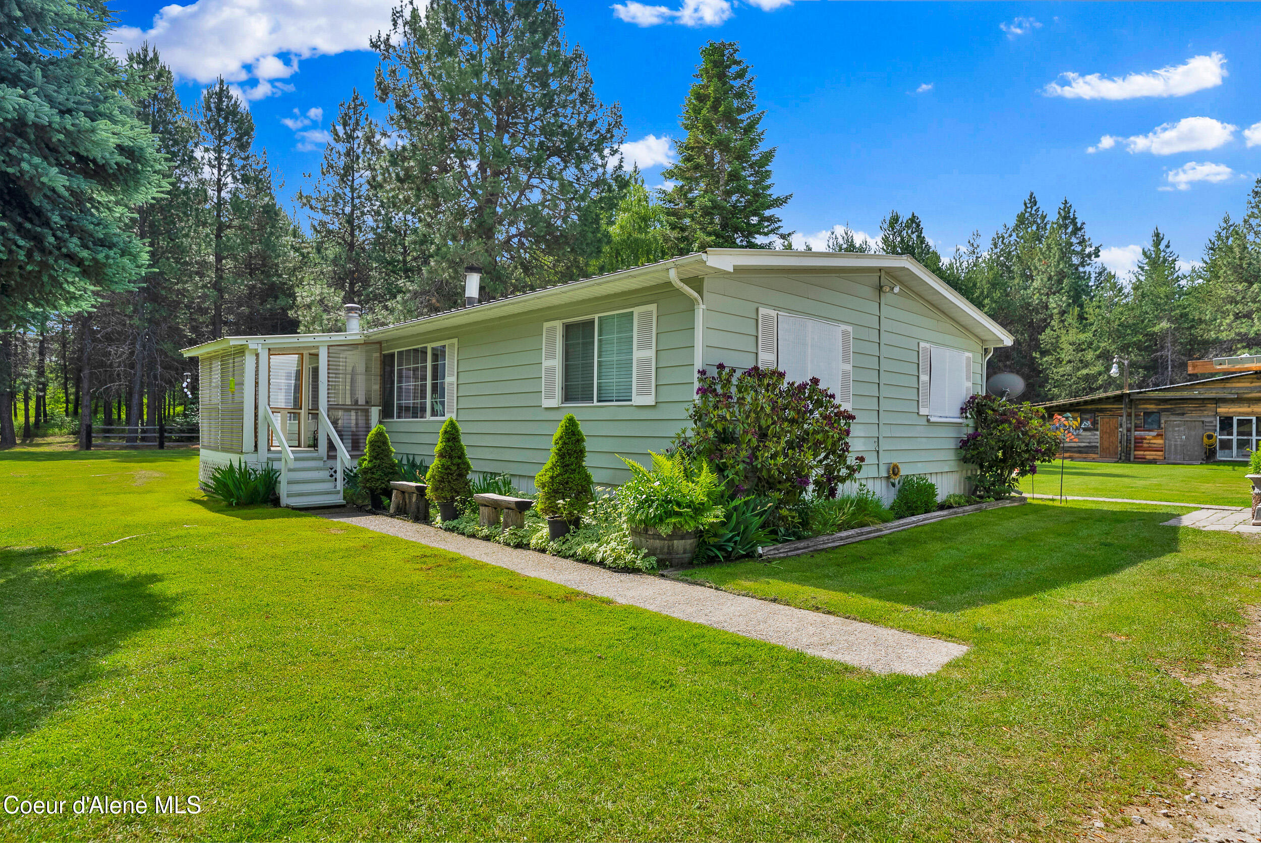 443 Herrmann Lake Road Sagle, ID 83860 - Photo 26 of 47 36 - Herrmann Lake front side