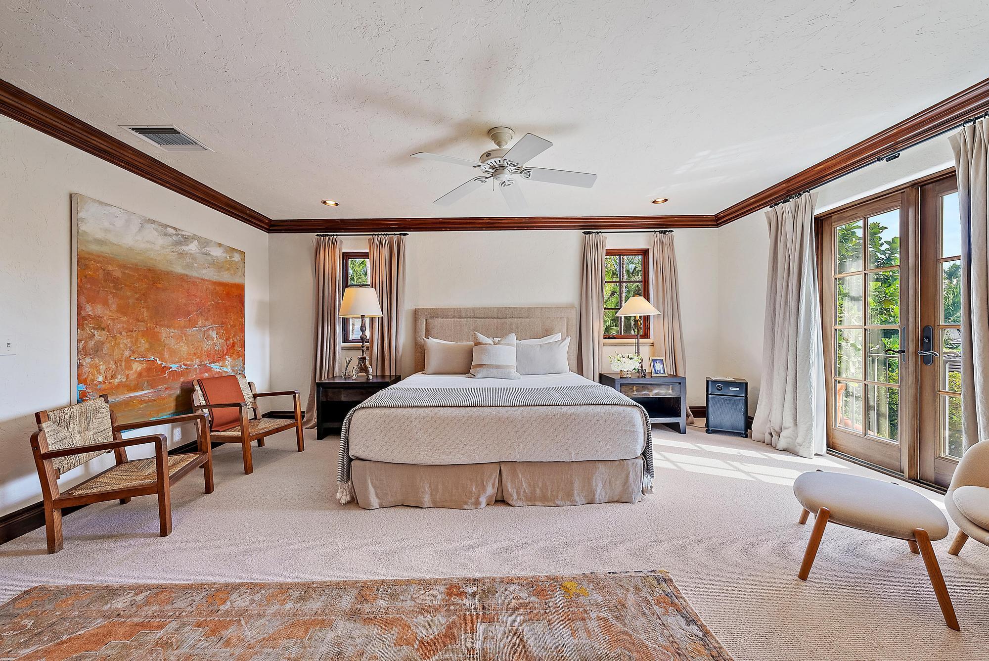 234 Ridgeview Drive Palm Beach, FL 33480 - Photo 14 of 20 a bedroom with a bed and large window