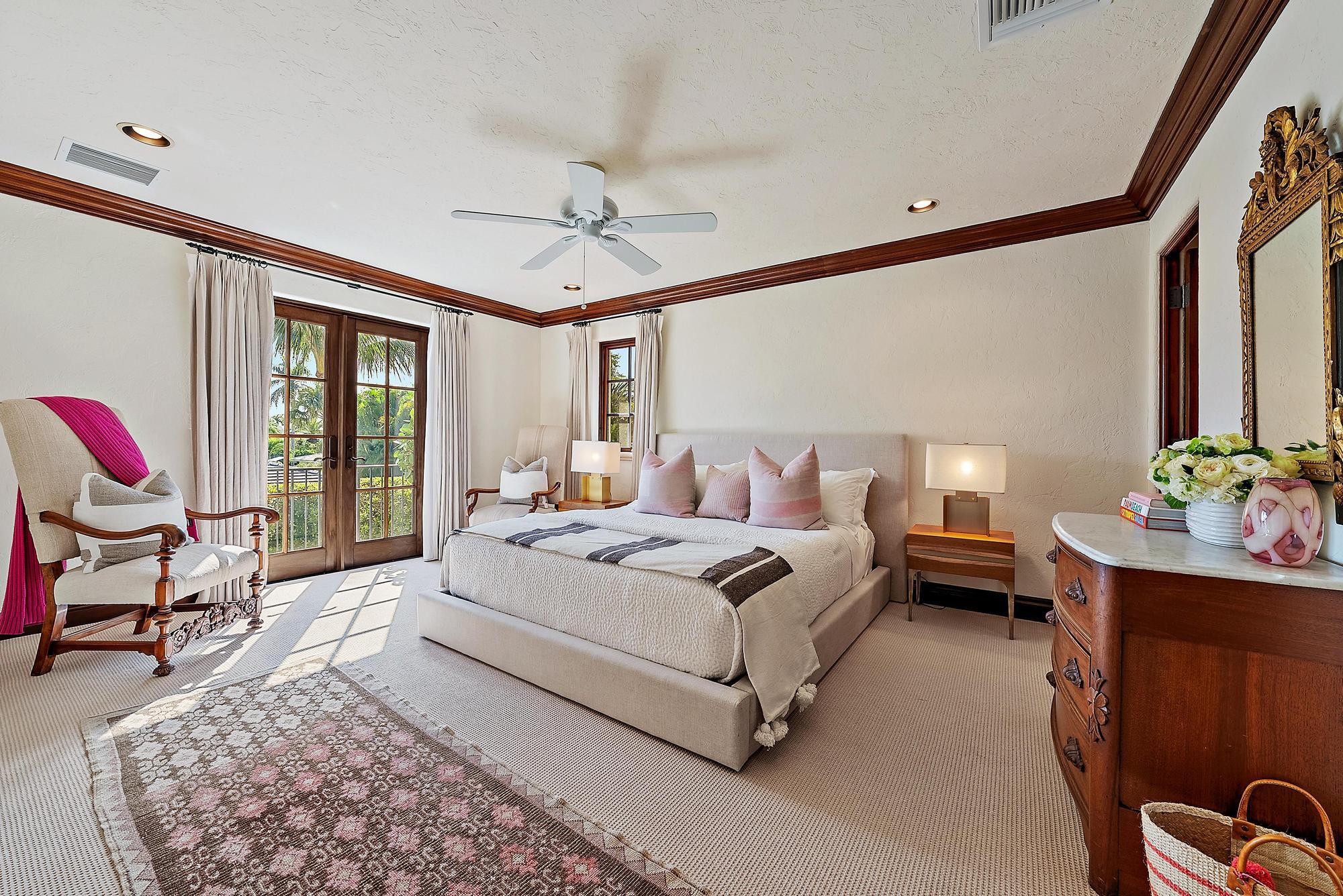 234 Ridgeview Drive Palm Beach, FL 33480 - Photo 16 of 20 a bedroom with a bed a couch and dresser