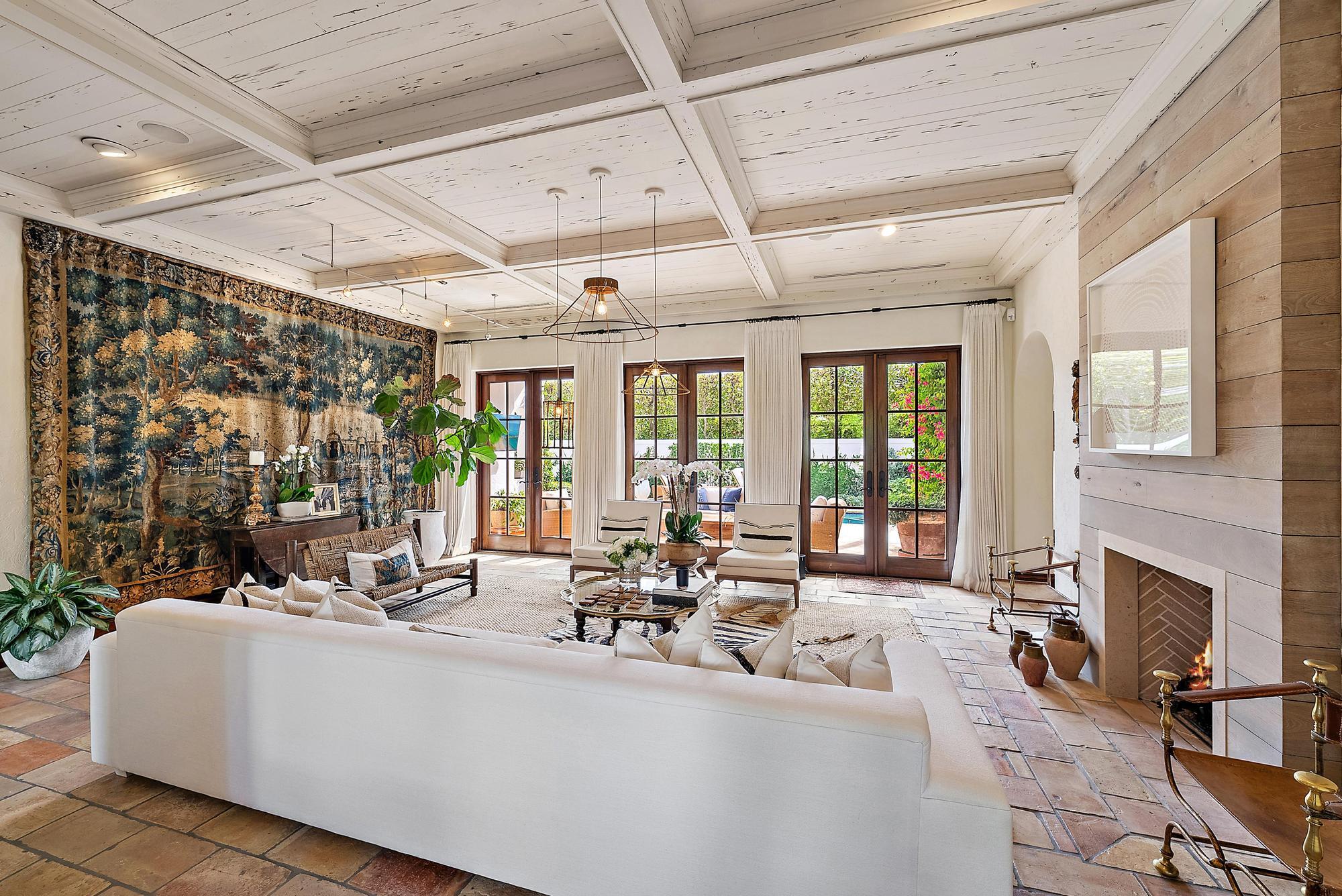 234 Ridgeview Drive Palm Beach, FL 33480 - Photo 3 of 20 a living room with couches a fireplace with wooden floor