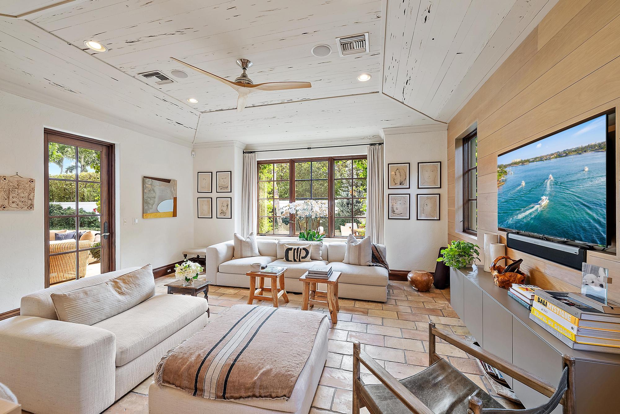 234 Ridgeview Drive Palm Beach, FL 33480 - Photo 8 of 20 a living room with furniture large window and flat screen tv