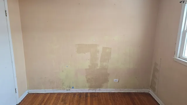 a view of a small space with wooden floor