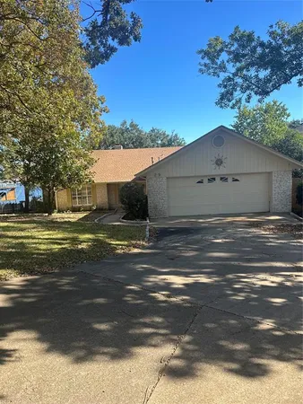 a view of a house with a big yard