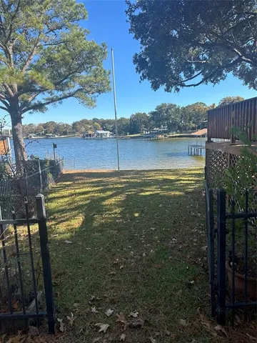 a view of a lake from a yard