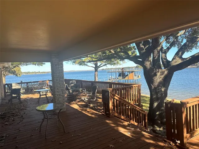 a view of balcony with chairs