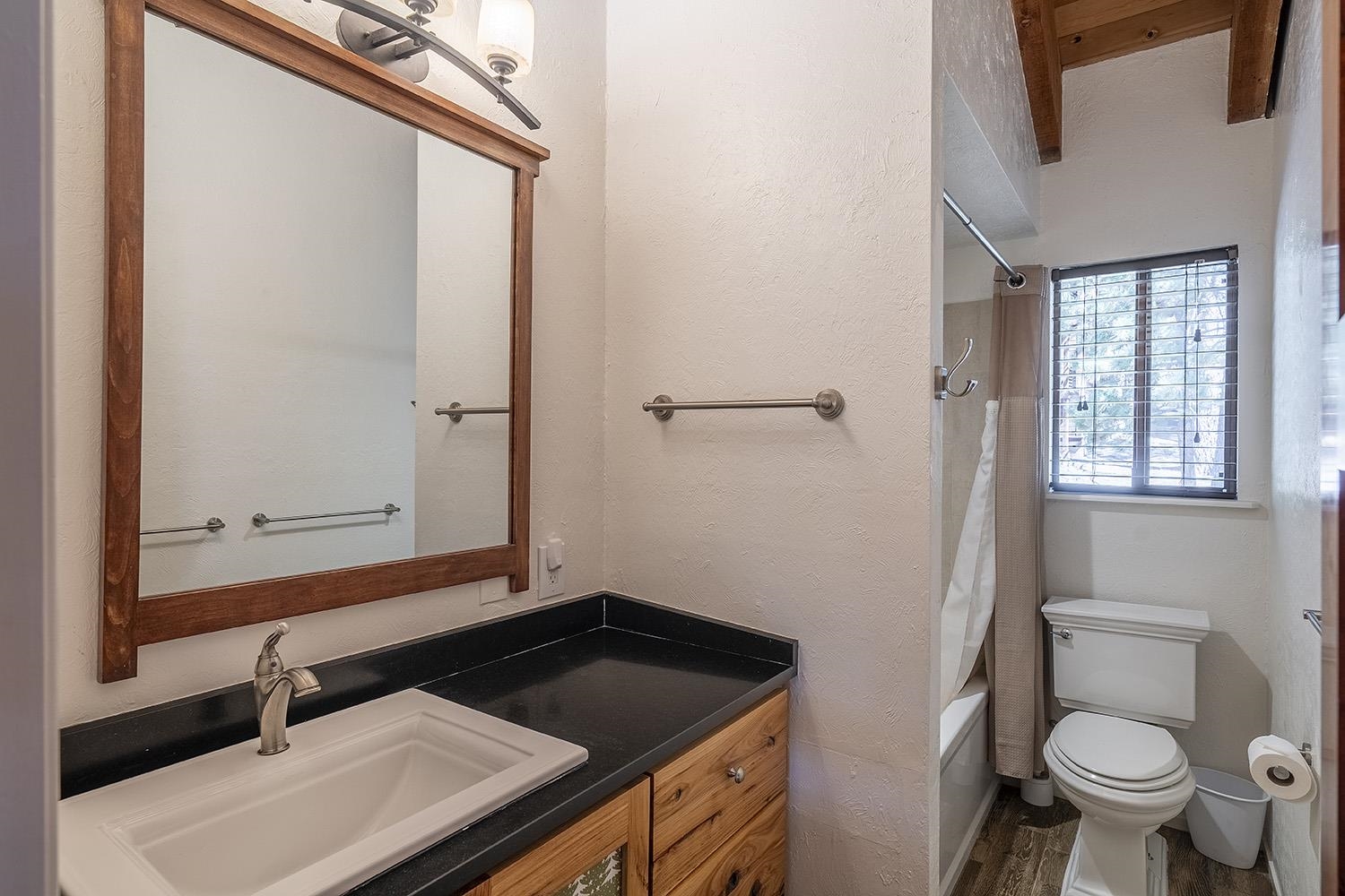 390 Forest Glen Road Olympic Valley, CA 96146 - Photo 16 of 25 a bathroom with a sink and a toilet