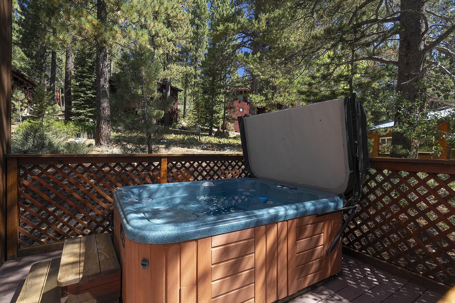390 Forest Glen Road Olympic Valley, CA 96146 - Photo 23 of 25 a wooden bench sitting in a yard