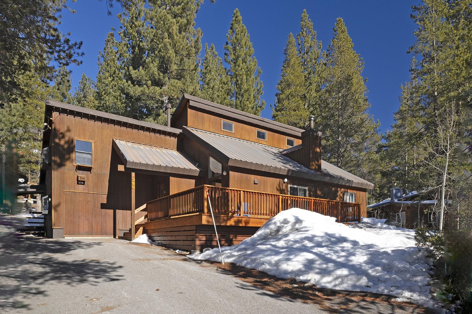 390 Forest Glen Road Olympic Valley, CA 96146 - Photo 24 of 25 a view of a house with a yard and wooden fence