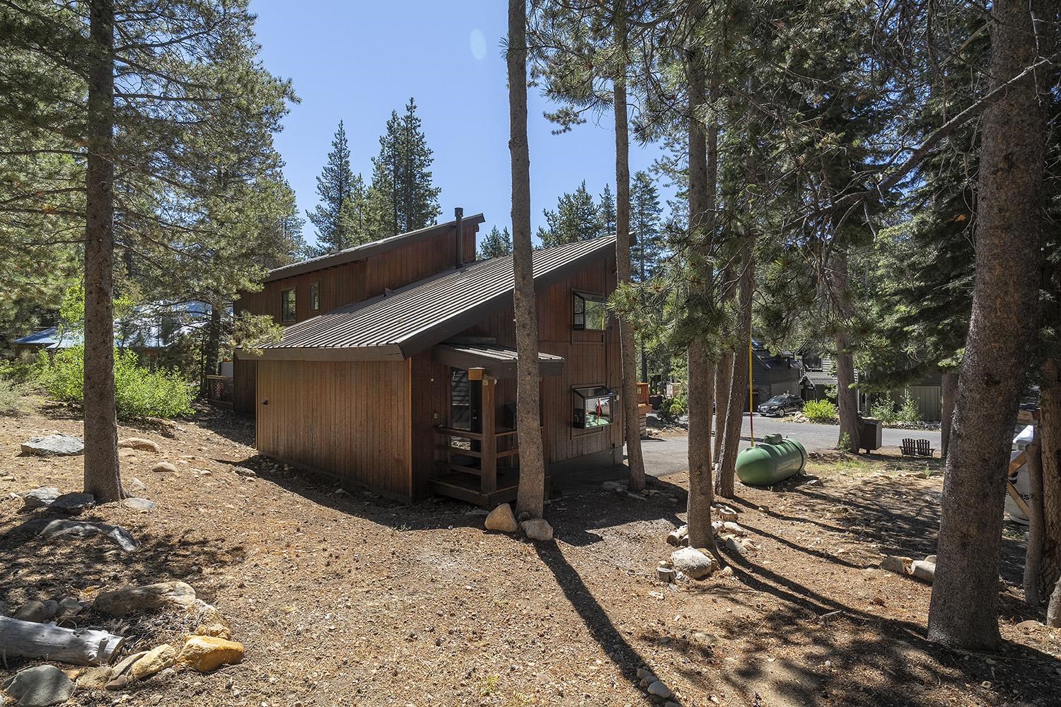 390 Forest Glen Road Olympic Valley, CA 96146 - Photo 25 of 25 a view of a house with a yard covered in snow