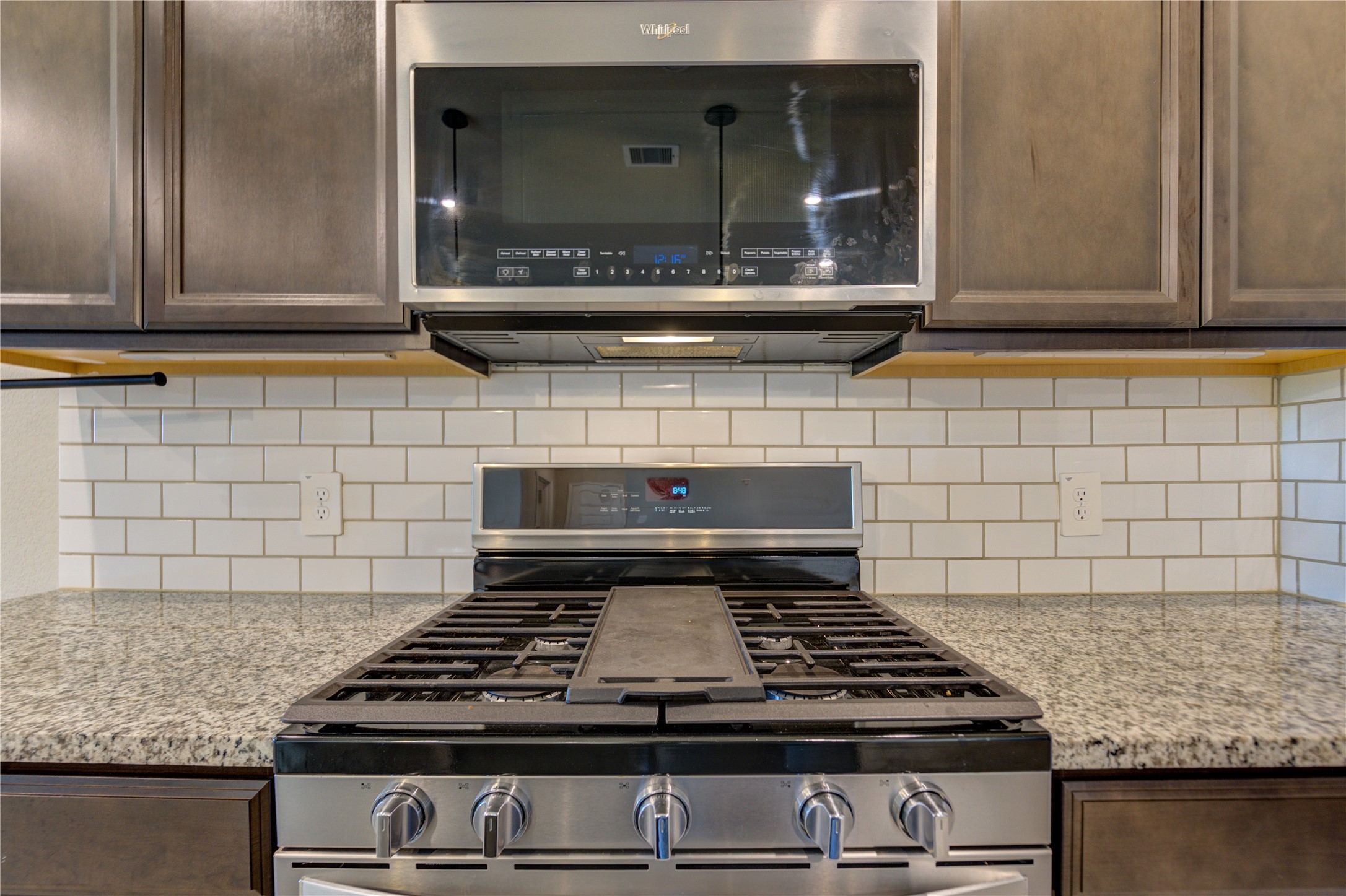 1207 Cascade Hls Drive Rosharon, TX 77583 - Photo 19 of 41 a stove top oven sitting inside of a kitchen