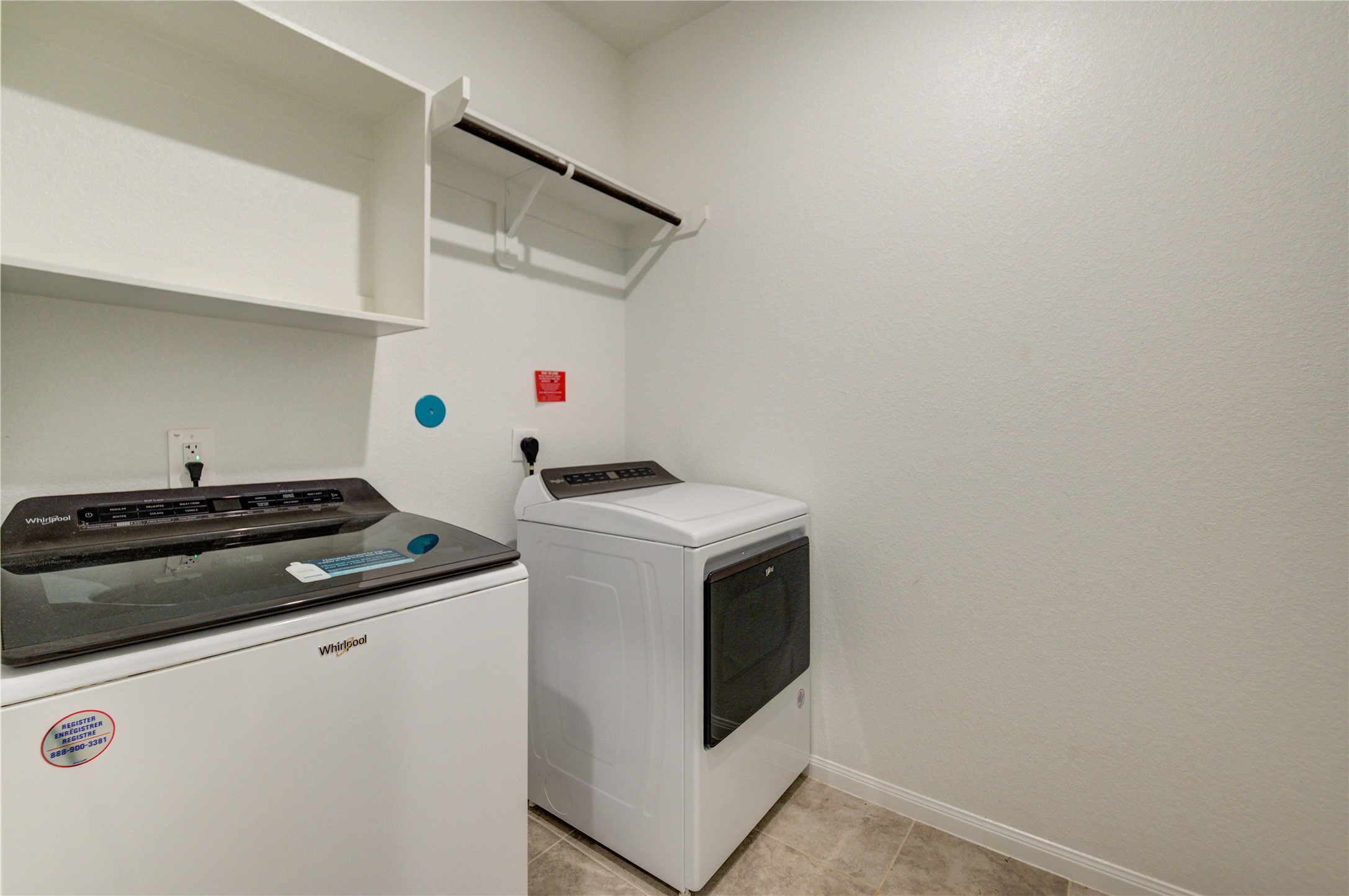 1207 Cascade Hls Drive Rosharon, TX 77583 - Photo 22 of 41 a utility room with dryer and washer