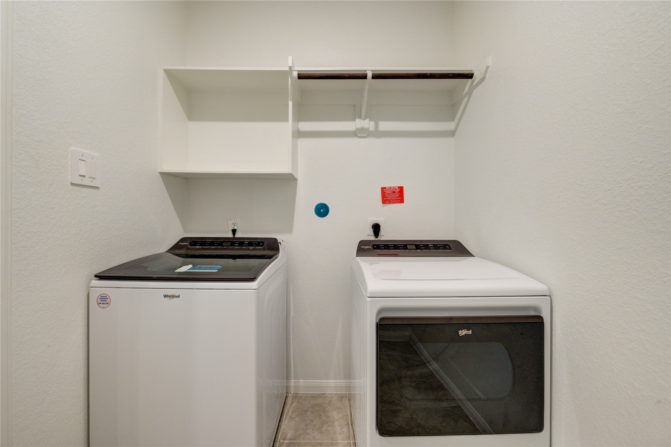 1207 Cascade Hls Drive Rosharon, TX 77583 - Photo 23 of 41 a utility room with dryer and washer