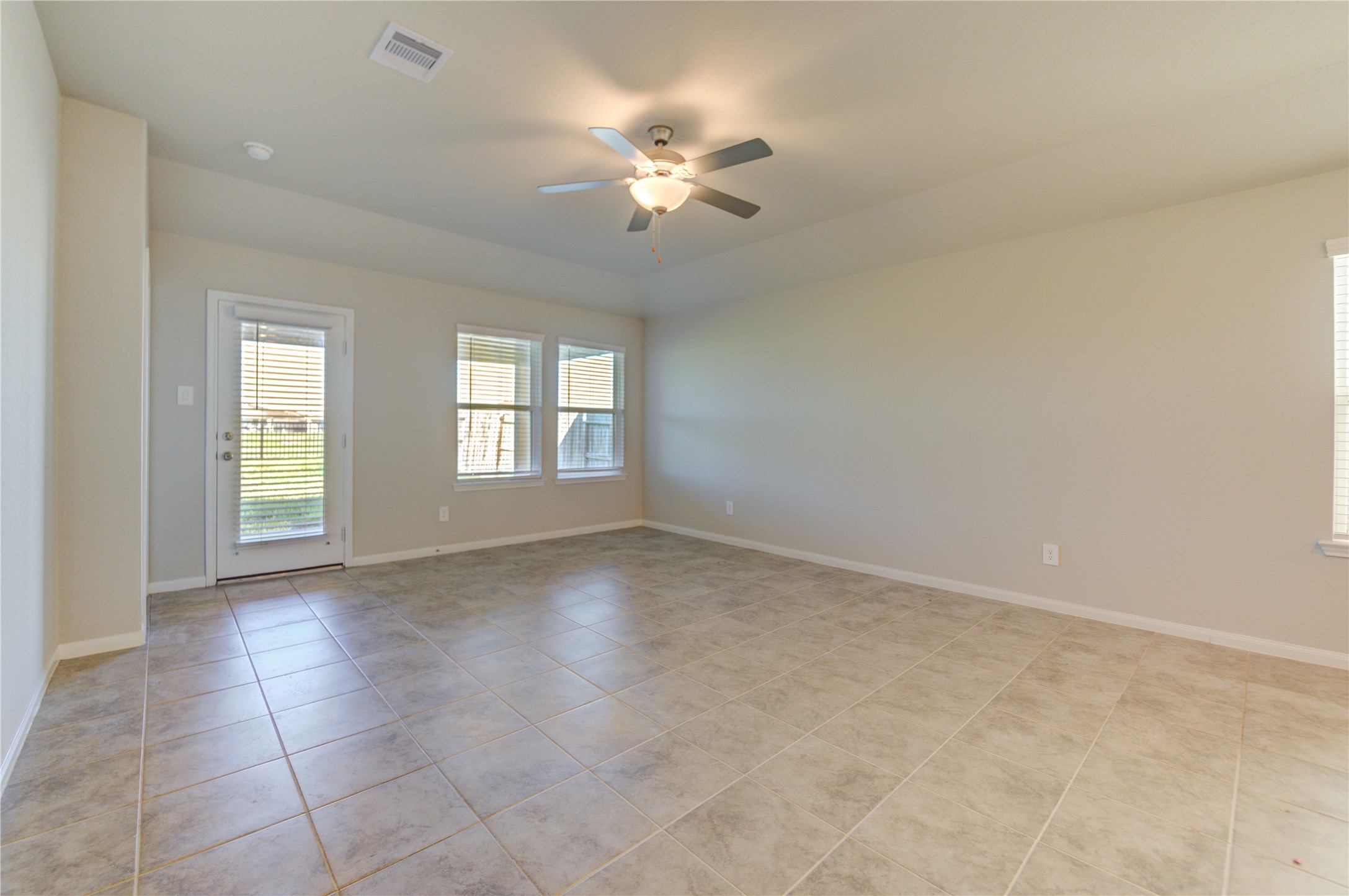 1207 Cascade Hls Drive Rosharon, TX 77583 - Photo 24 of 41 wooden floor in an empty room with a window