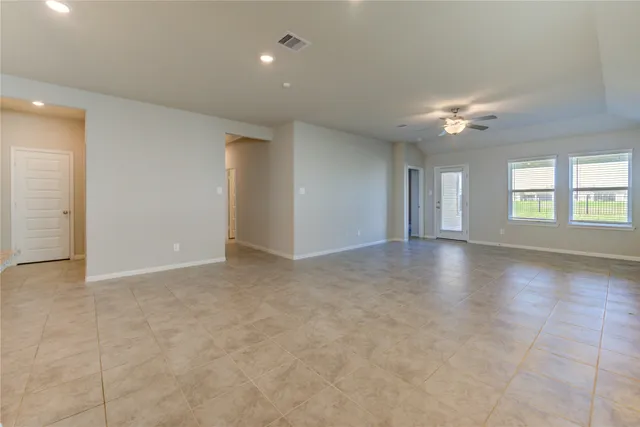 a view of kitchen and livingroom with furniture