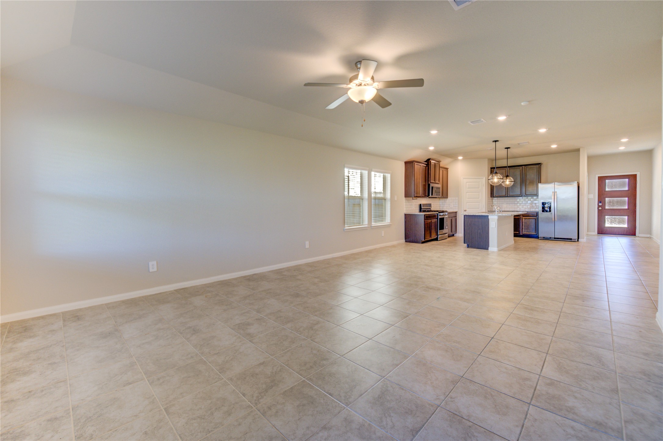 1207 Cascade Hls Drive Rosharon, TX 77583 - Photo 30 of 41 a view of a kitchen with a sink and cabinets