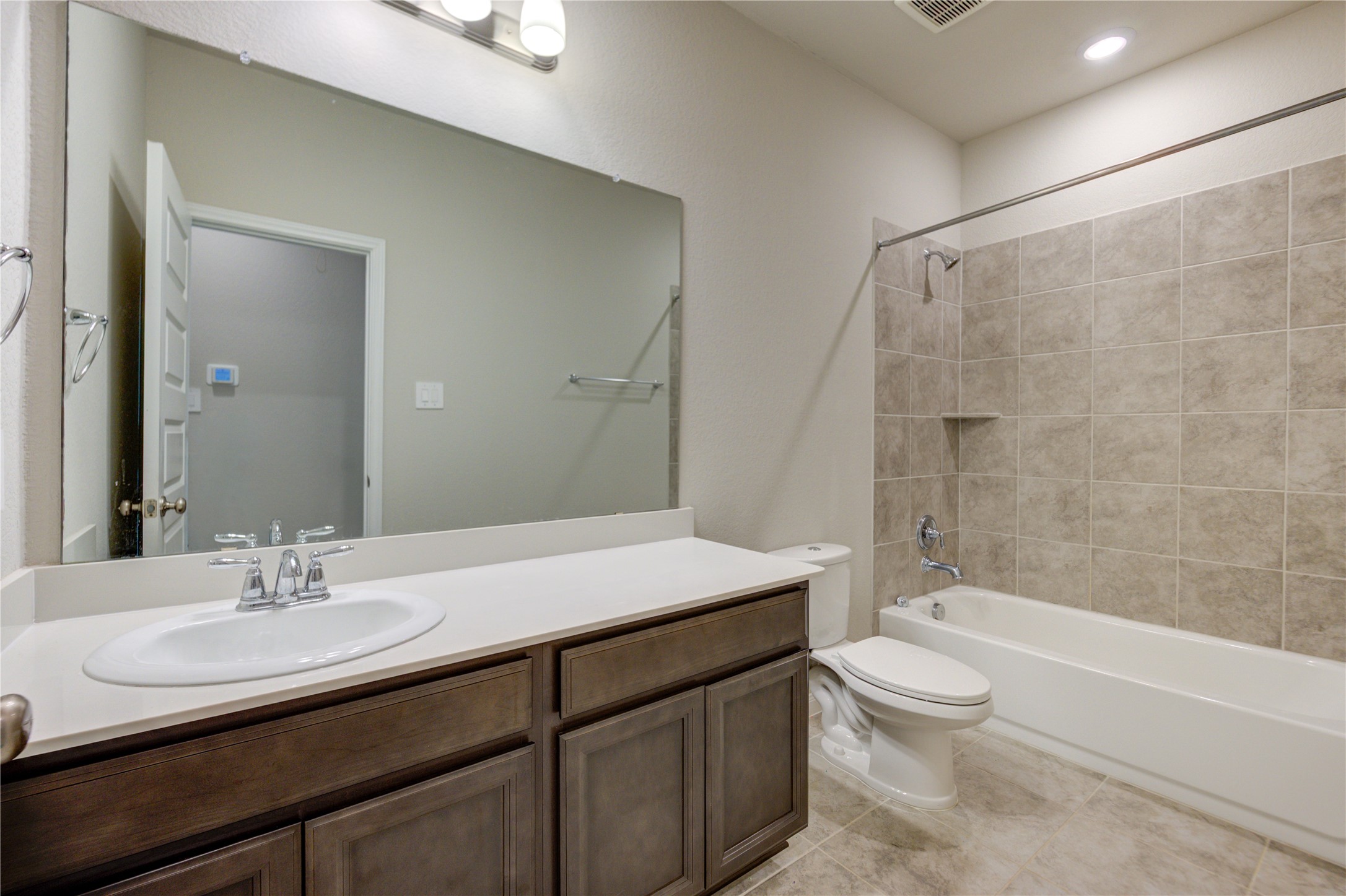 1207 Cascade Hls Drive Rosharon, TX 77583 - Photo 31 of 41 a bathroom with a sink a toilet and shower
