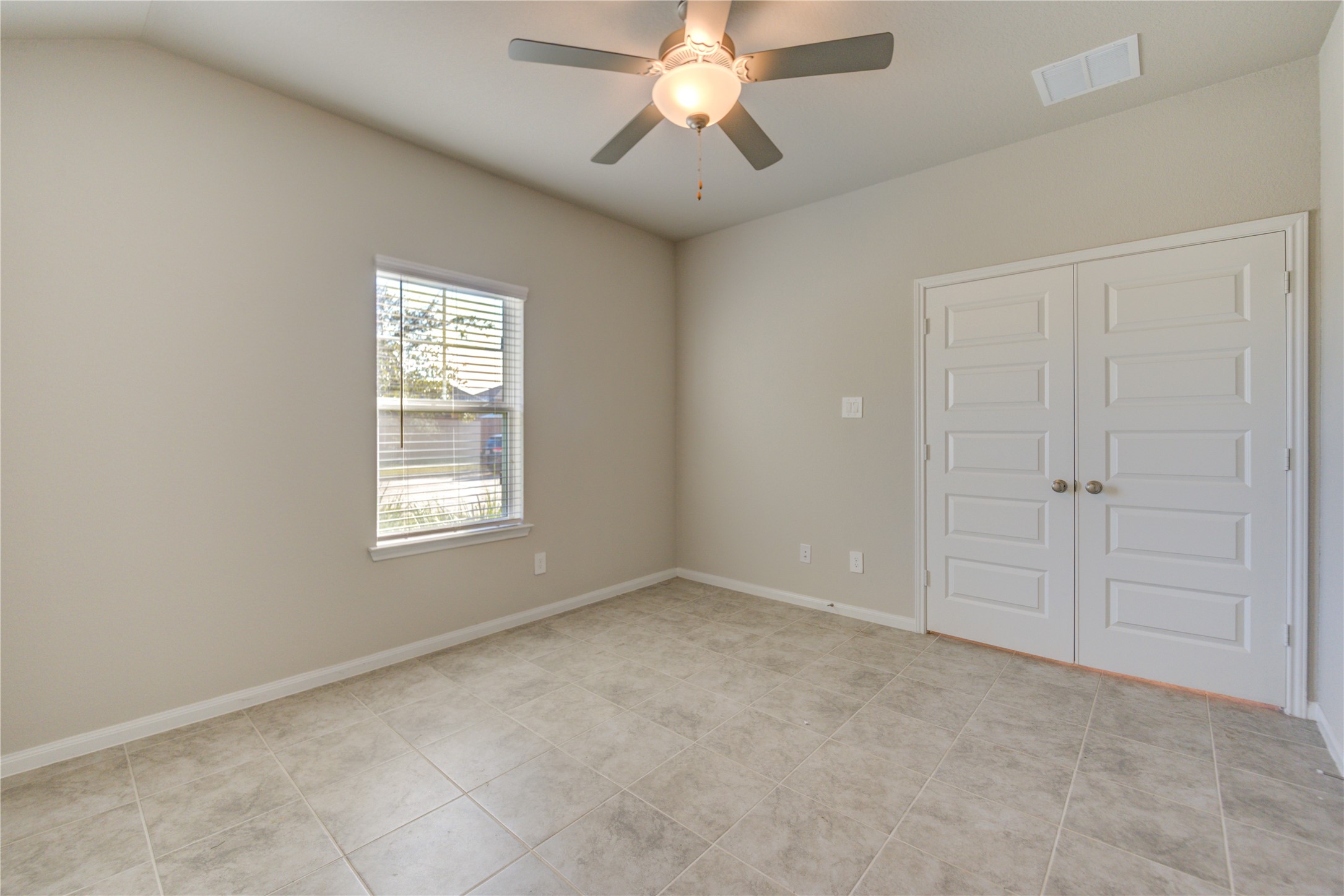 1207 Cascade Hls Drive Rosharon, TX 77583 - Photo 6 of 41 a view of an empty room with a window