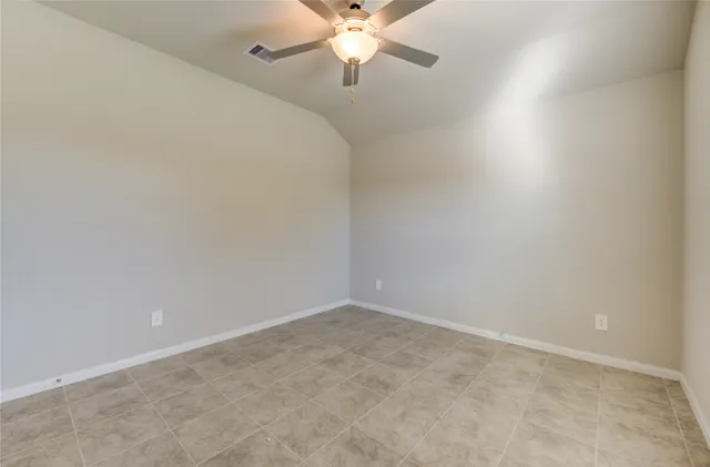a view of an front door and wooden floor
