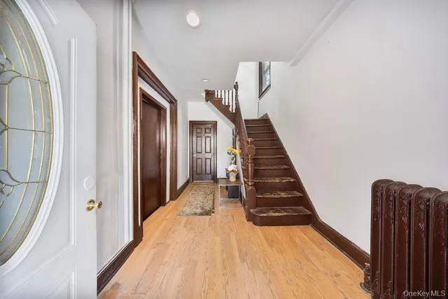a view of a hallway with stairs