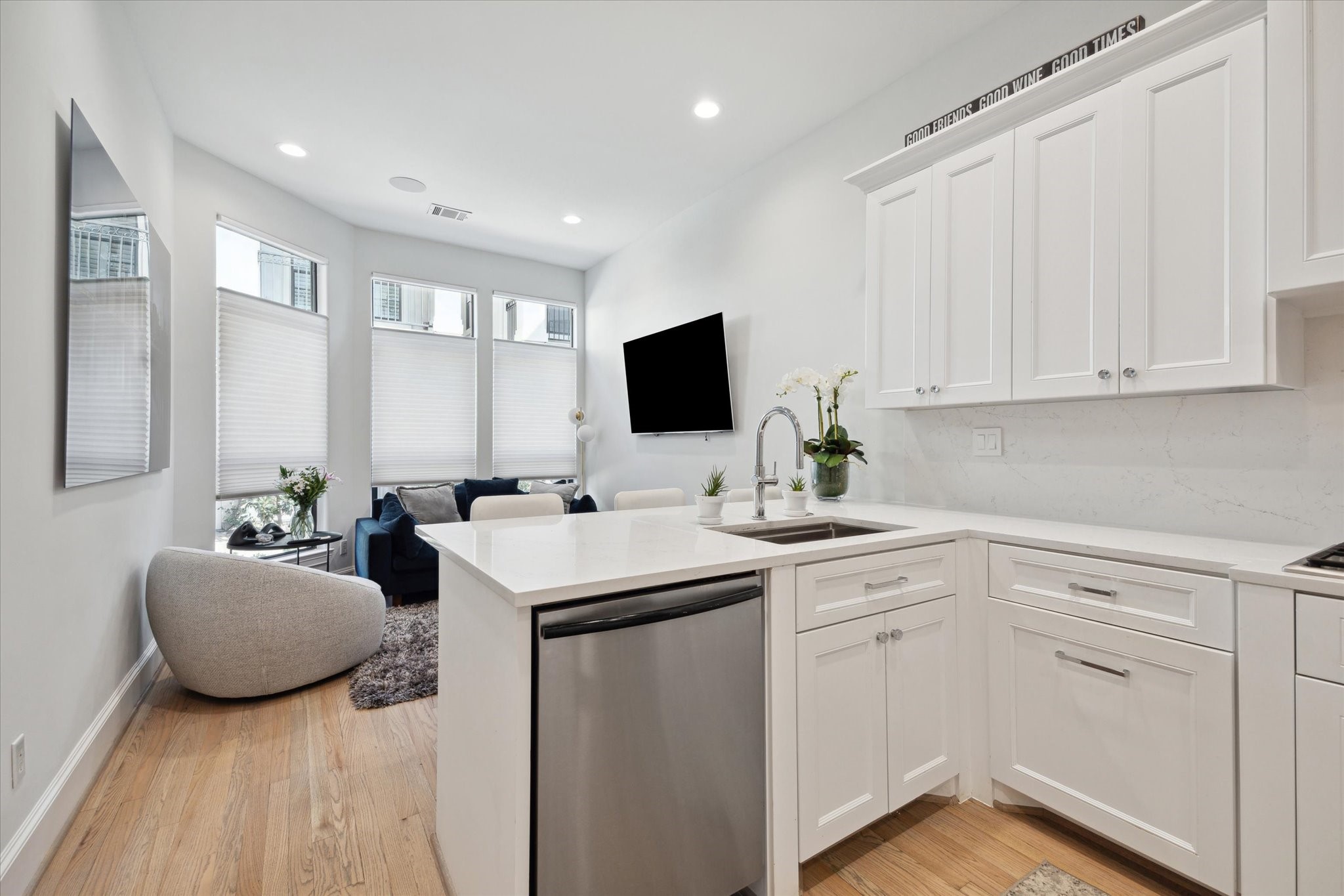 2911 Mid Lane Houston, TX 77027 - Photo 16 of 31 a kitchen with sink refrigerator and cabinets