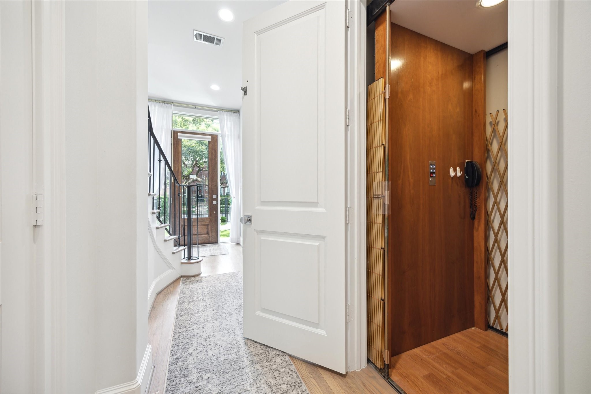 2911 Mid Lane Houston, TX 77027 - Photo 17 of 31 a view of a hallway with wooden floor and closet