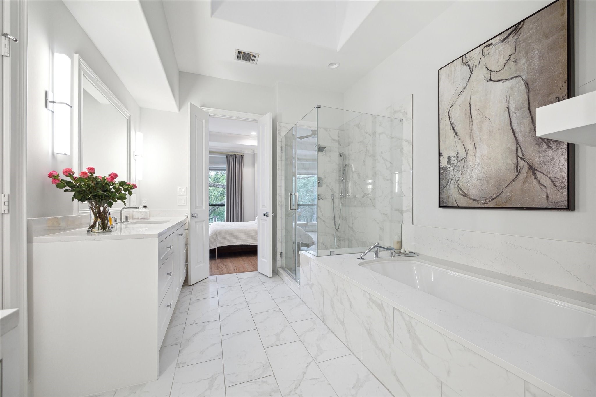 2911 Mid Lane Houston, TX 77027 - Photo 23 of 31 a view of bathroom with a tub shower and mirror