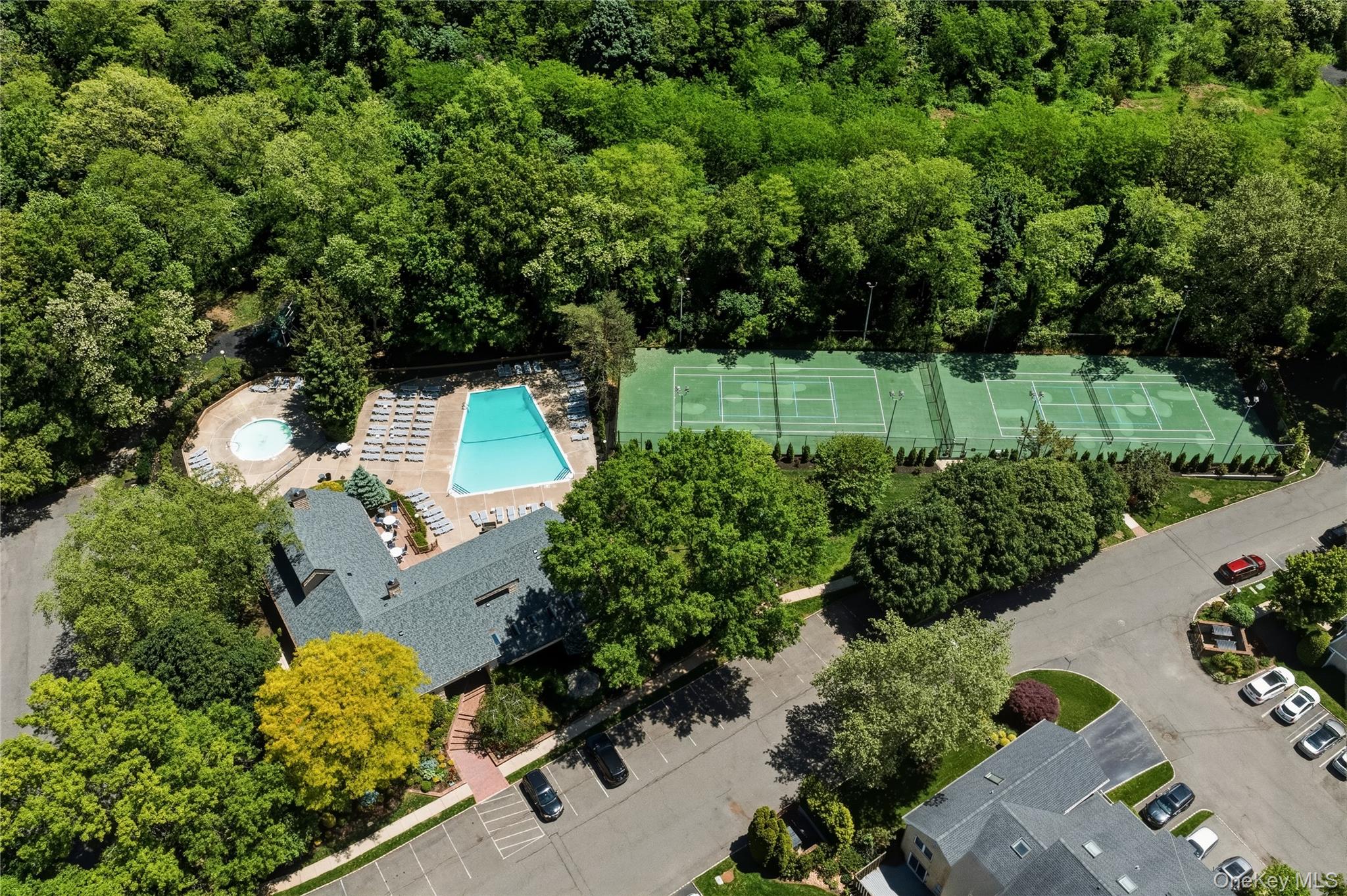 44 Hidden Ridge Drive Syosset, NY 11791 - Photo 26 of 28 an aerial view of a house with a yard and outdoor seating
