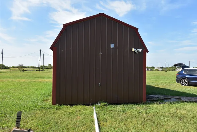 a view of a porch with a yard