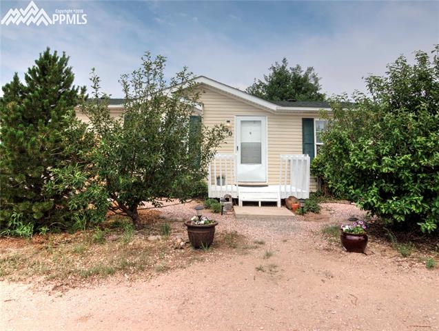 890 Ranchette Place Calhan, CO 80808 - Photo 2 of 26 Cute front porch