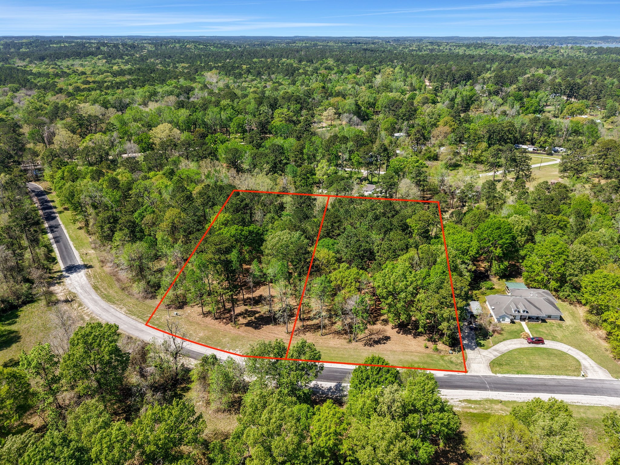 0 Harrell Cemetery Road Coldspring, TX 77331 - Photo 1 of 10 an aerial view of residential houses with outdoor space and trees