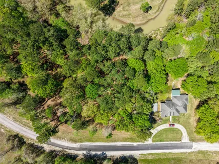 a view of a large yard with lots of green space