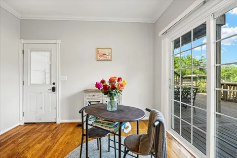 a bedroom with a bed and a chair