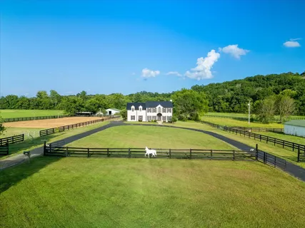 a view of a house with a big yard