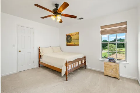 a view of a house with a big yard